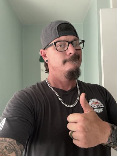 John Horn, owner of All Done Plumbing, in a company shirt